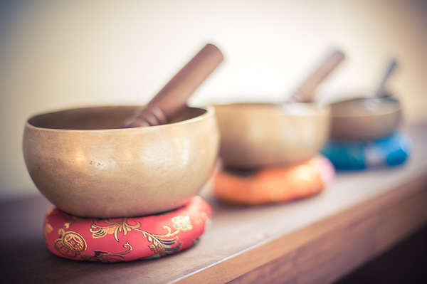 Tibetan singing bowls in a line